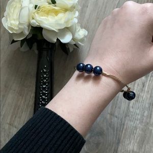 blue gold sphere bracelet